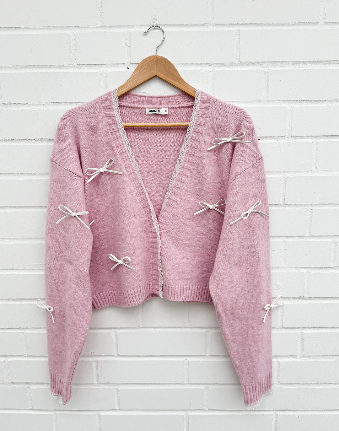 STRICKJACKE MIT AUFGESETZTEN LEDER SCHLEIFEN - rosa