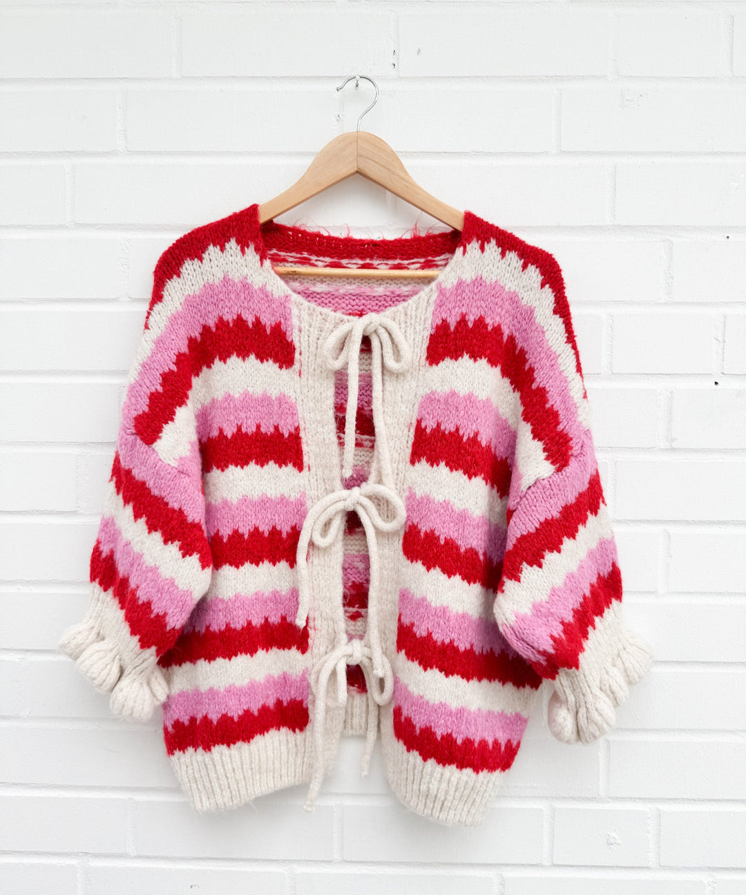 RÜSCHEN WAVE STRICKJACKE - pink rot