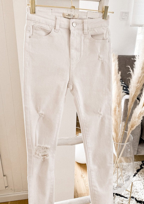 WHITE DRESTROYED SKINNY JEANS