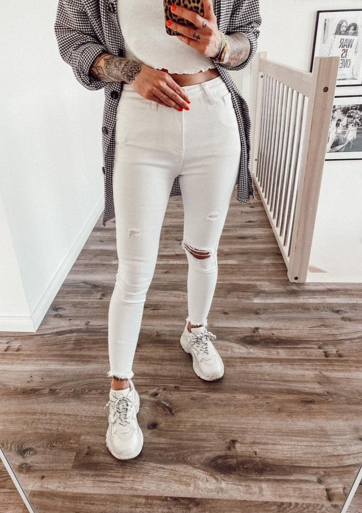 WHITE DRESTROYED SKINNY JEANS