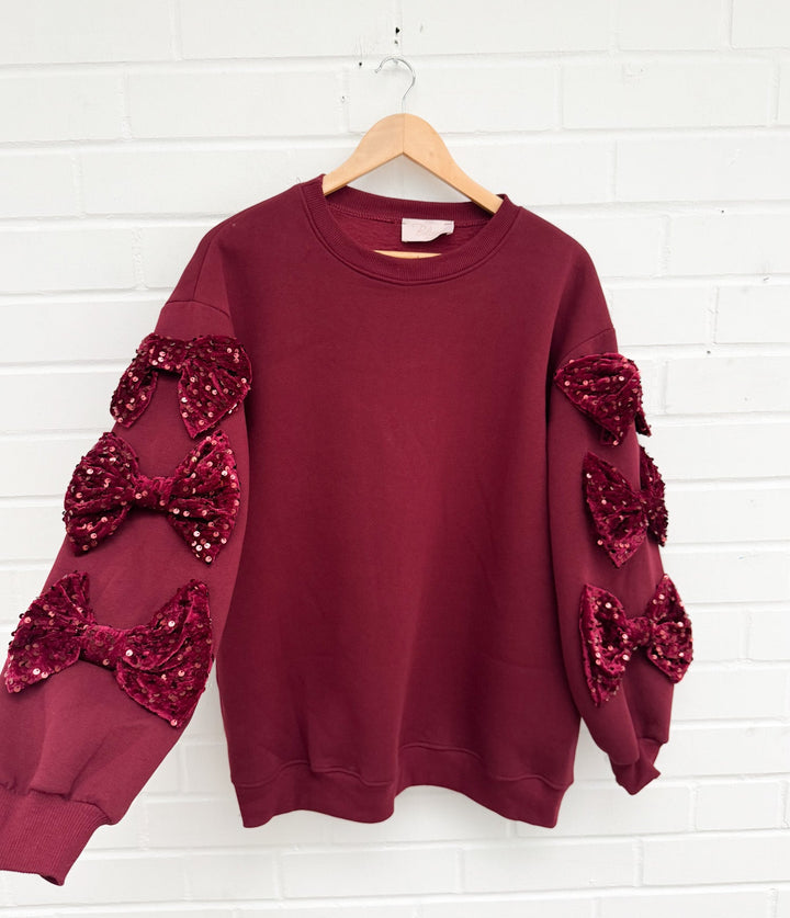 SWEATSHIRT MIT PAILLETTEN SCHLEIFEN - versch. Farben