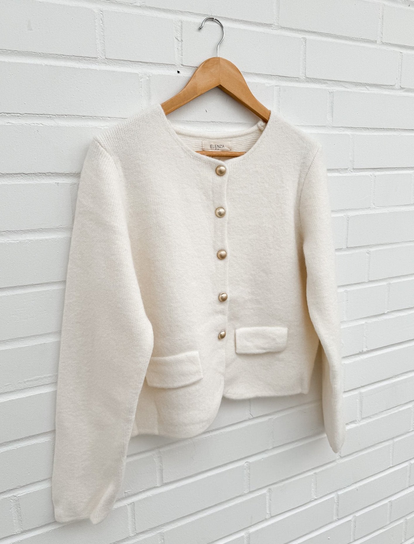 CREME STRICKJACKE